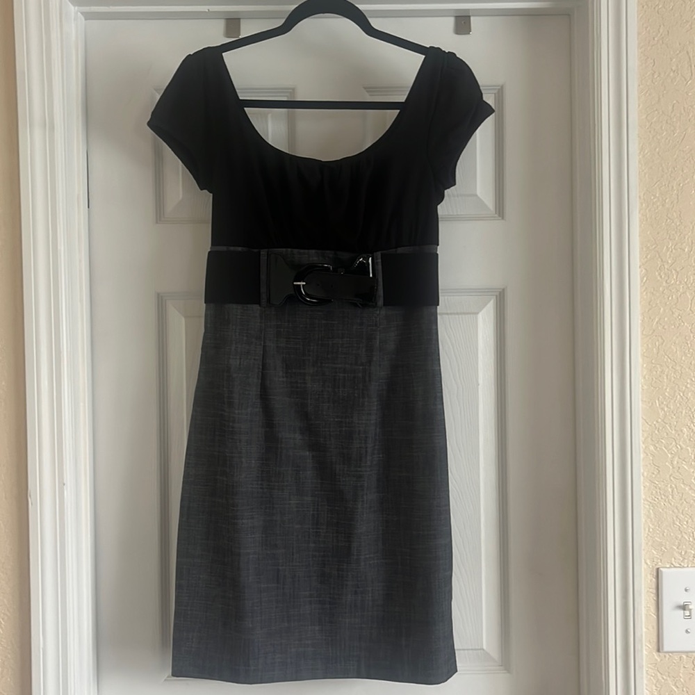 Black and grey dress with stretch belt.